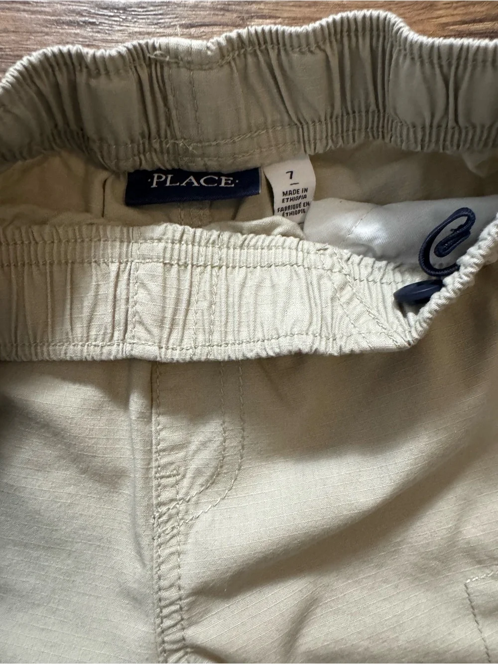 The Children’s Place Boys Cargo Shorts Trio - Navy, Khaki, Tan.